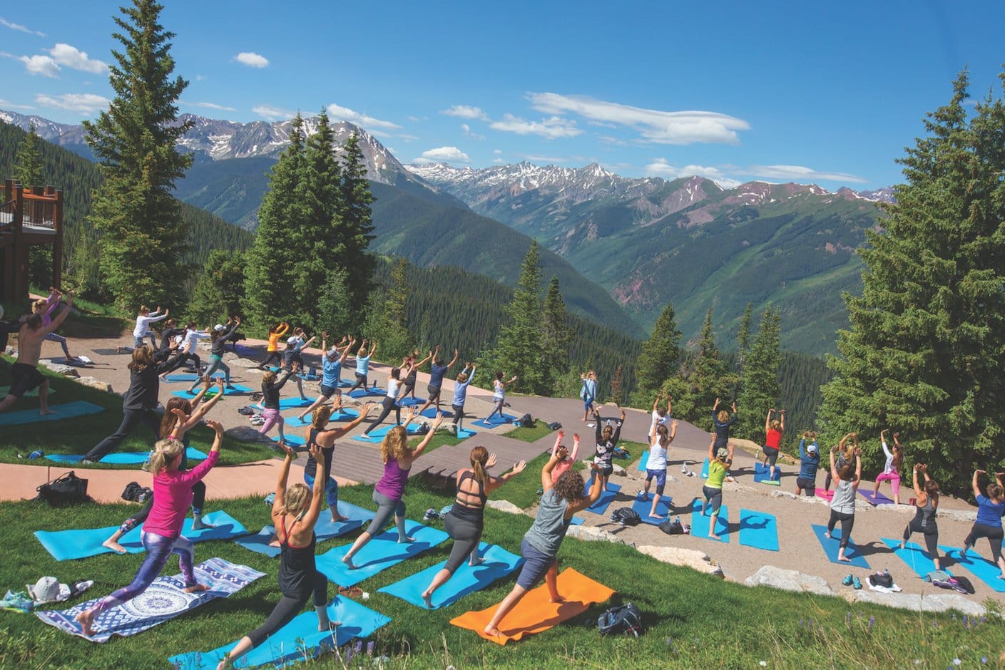 Outdoor yoga with mountain views, one of the relaxing things to do in summer in Aspen