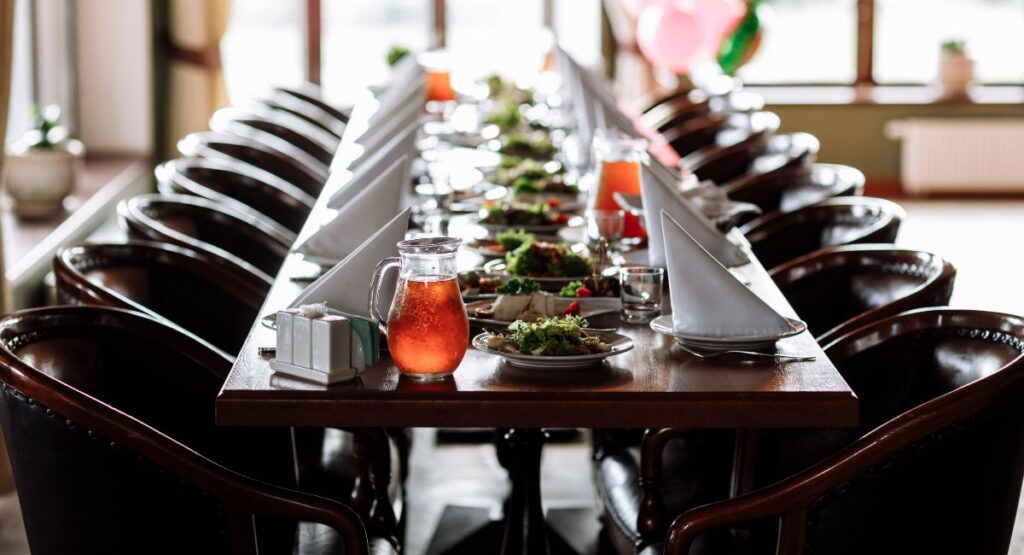 Beautiful table set for an event party or wedding reception. restaurant interior.
